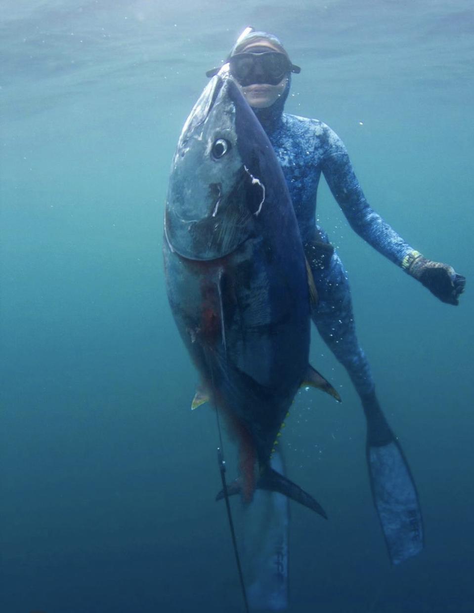Valentine Thomas catching a tuna