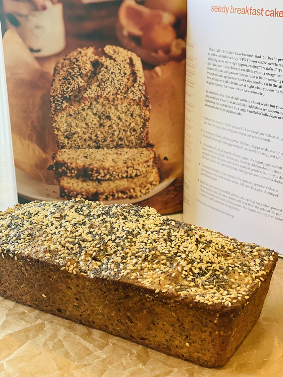 Alison Roman's Seedy Breakfast Cake is a quick bread/cake for anyone who loves seedy, crunchy granola in any form. The recipe bakes up beautifully and looks just like the photograph in her latest cookbook as you can see in this Portrait of The Seedy Breakfast Cake that Elizabeth Karmel baked and set infant of the photo in the cookbook.