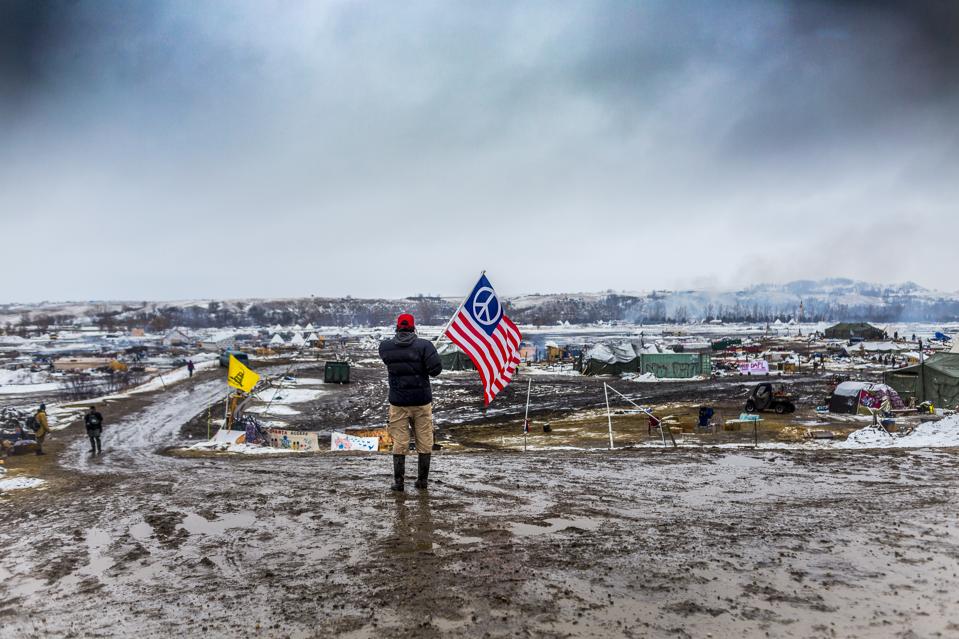 Defiant Dakota Access Pipeline water protectors faced-off...