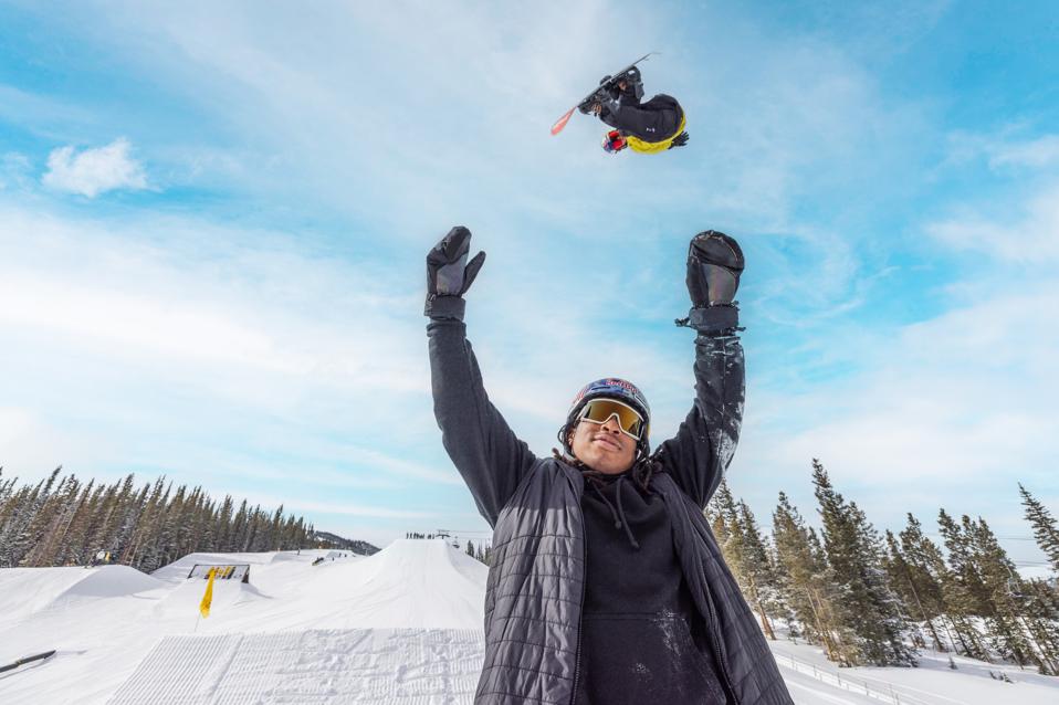 Jake Canter jumps over Zeb Powell at Red Bull Slide In Tour at Copper Mountain