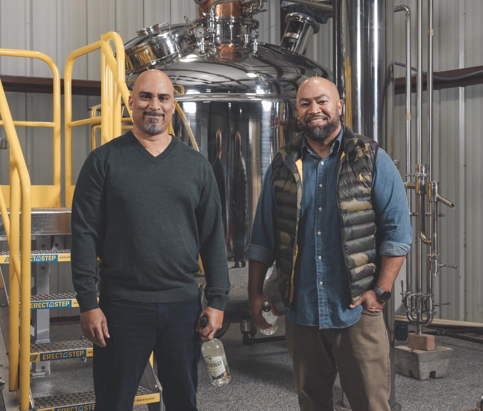 Wendell Robbins and Ben Williams  in the distillery