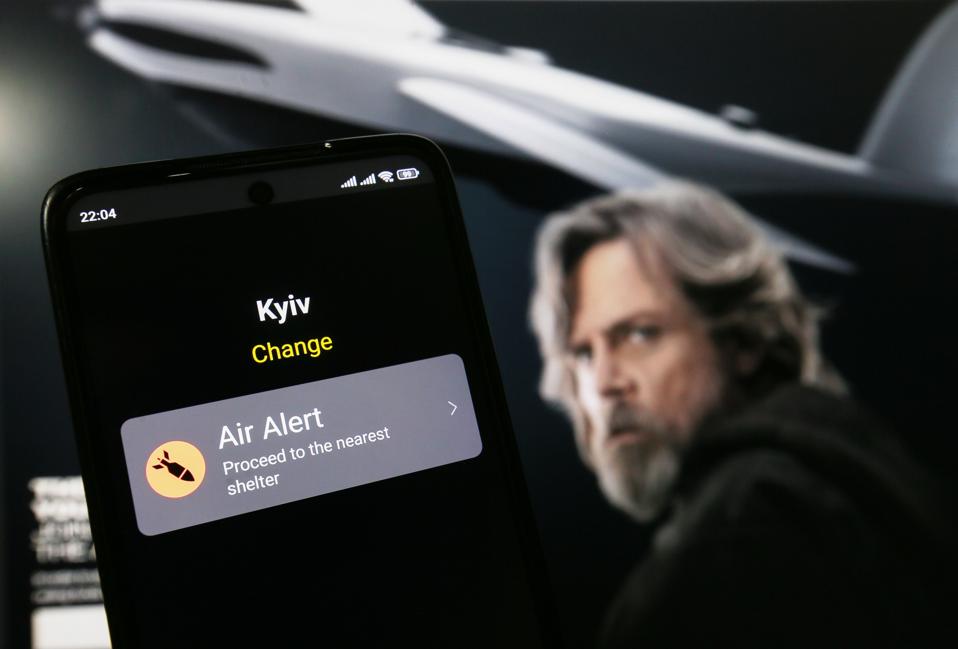 In this photo illustration, an Air Alert app is seen on a...