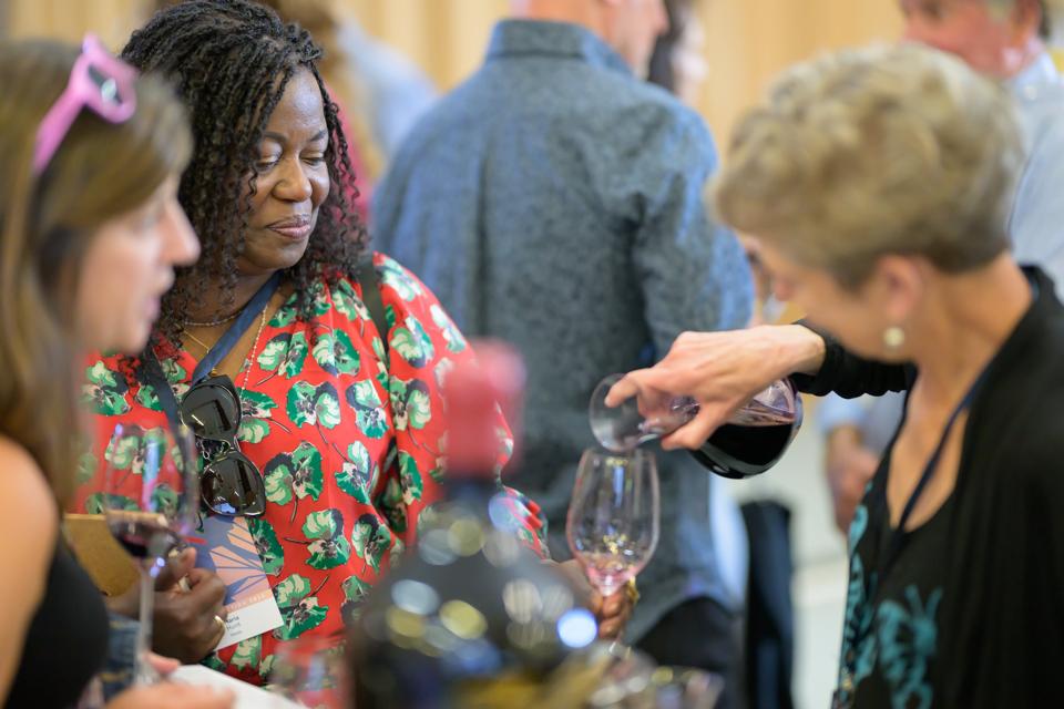 Consumers Sample Wine at the Collective Napa Valley Barrel Auction at Louis M. Martini Winery