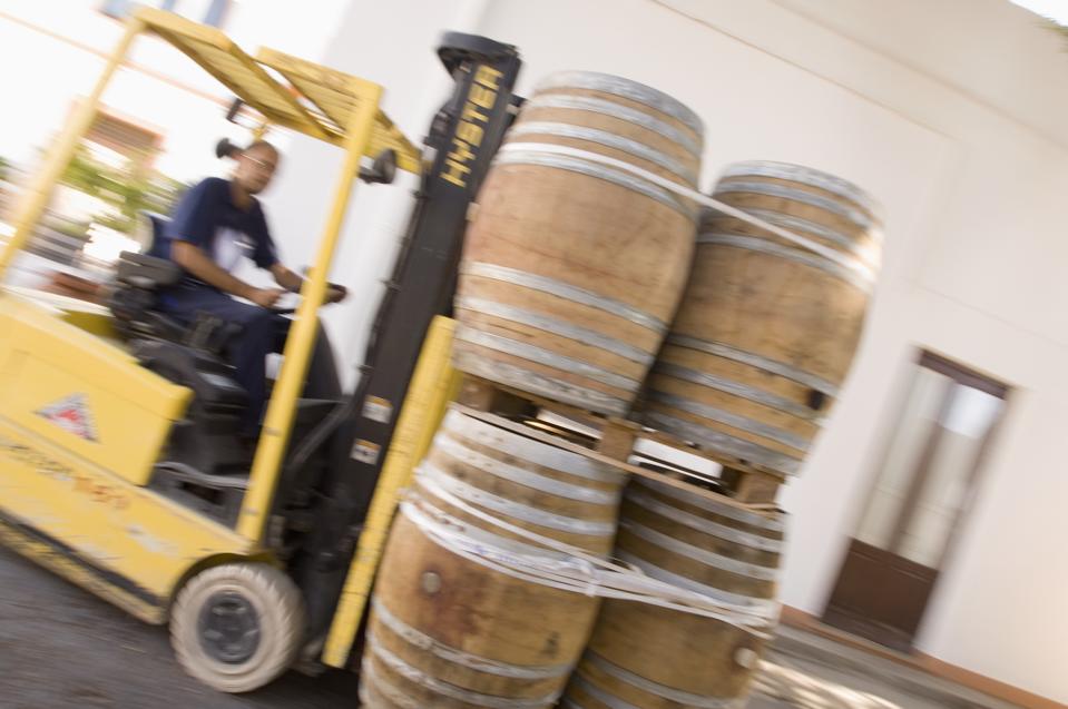 Moving Wine Barrels at Donnafugata Winery