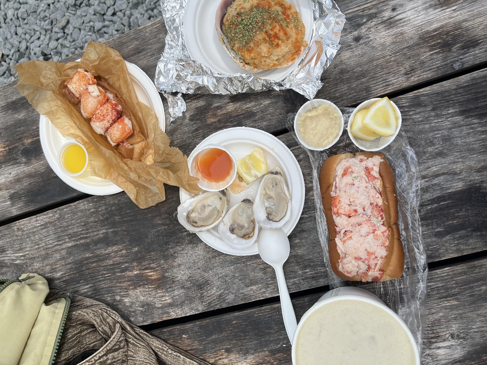 Clam chowder, stuffed quahog, oysters from Menemsha, and two lobster rolls, one buttered hot and one cold as a salad.