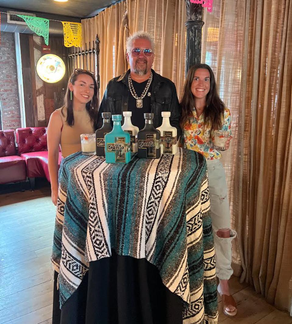 Vicki Denig with Stephanie Denig and Guy Fieri of Santo Spirits