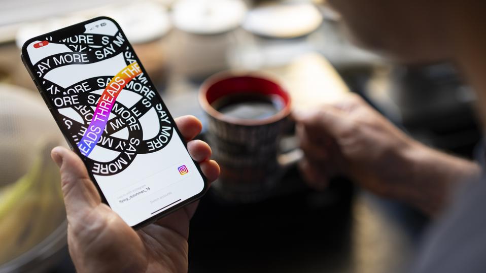 Threads App On IPhone Illustration