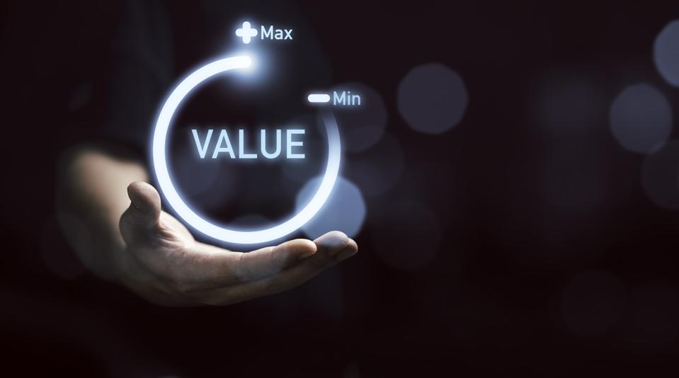 Businessman holding virtual download icon progress for increasing value added to business product and service concept.