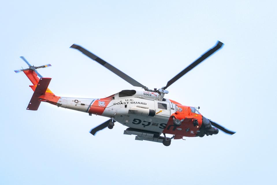 U.S. Coast Guard Sikorsky MH-60T Jayhawk helicopter flies overhead