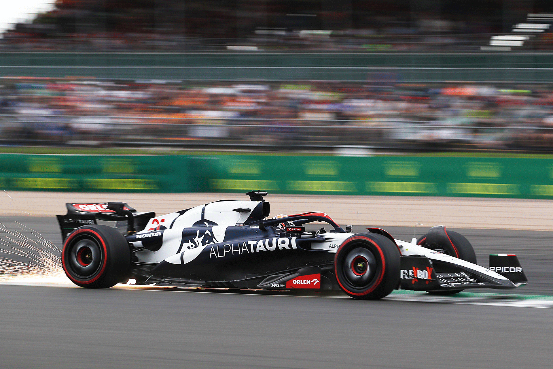 The AlphaTauri car on the track.