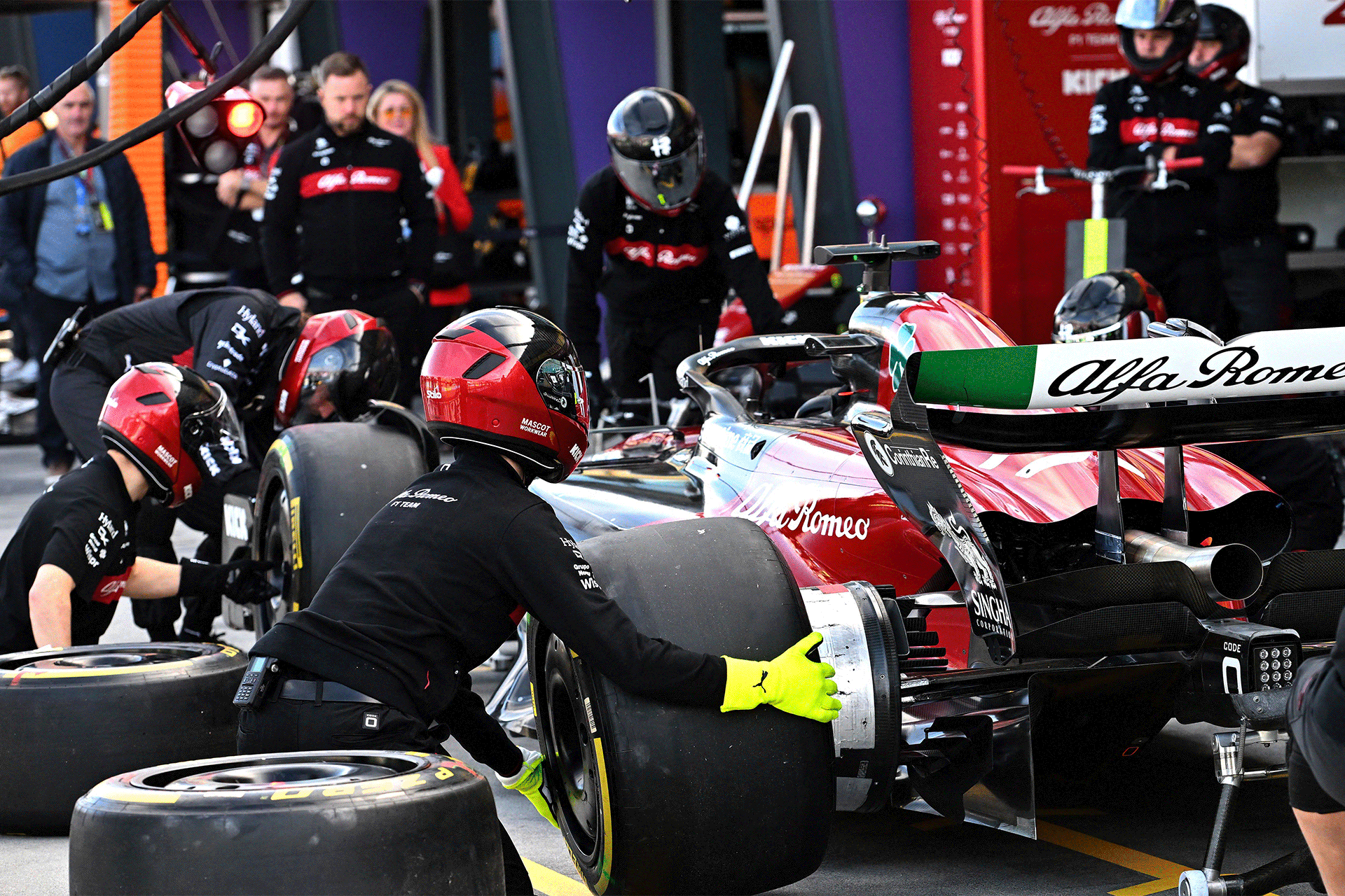 The Alfa Romeo F1 car during a pit stop.