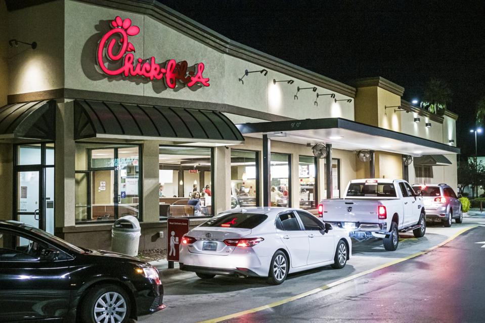 Florida, Brooksville, Chick-fil-A, fast food chicken restaurant, drive thru line due to Pandemic