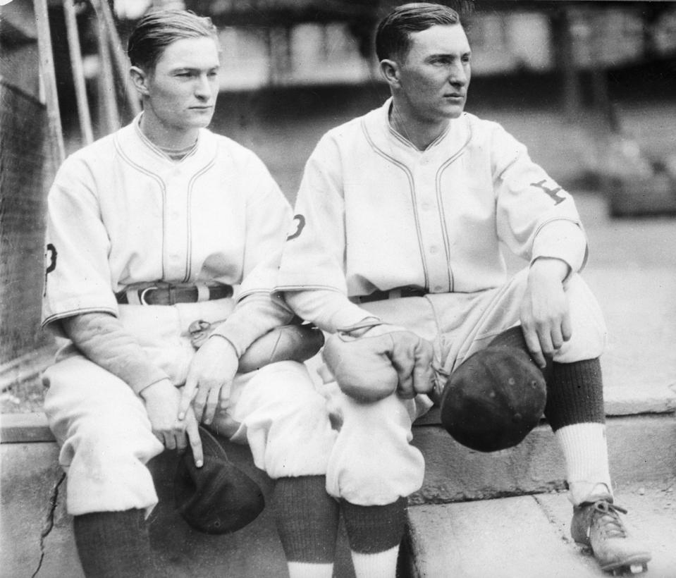 Lloyd and Paul Waner Seated In Uniform