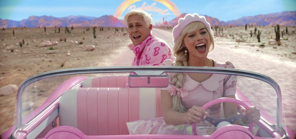 This image released by Warner Bros. Pictures shows Ryan Gosling and Margot Robbie in a scene from "Barbie."