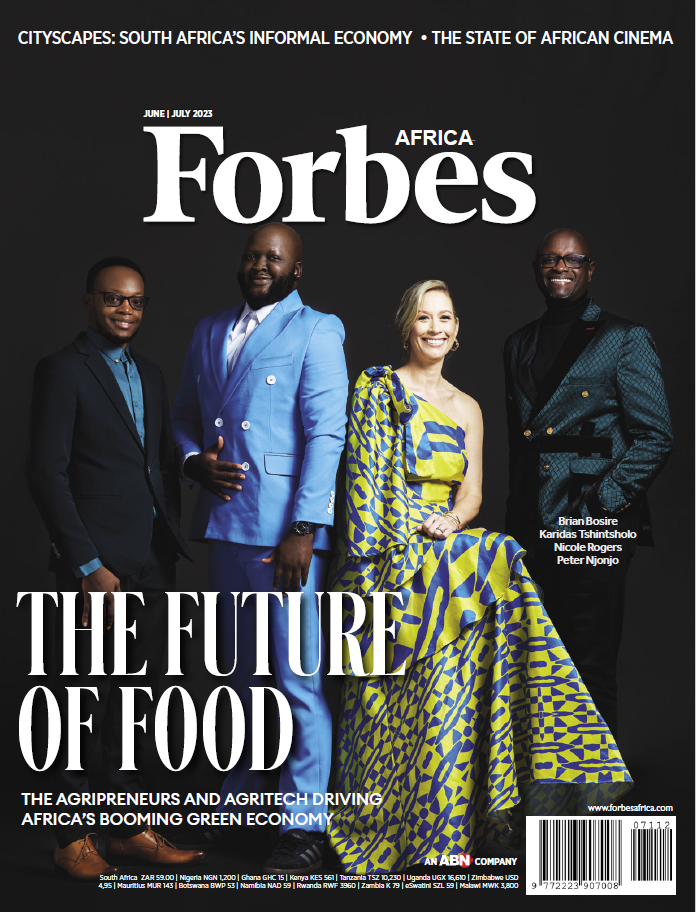 Four individuals pose side-by-side on the cover of Forbes Africa.