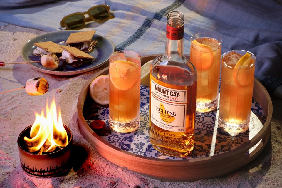 Mount Gay Eclipse Rum on tray with cocktails