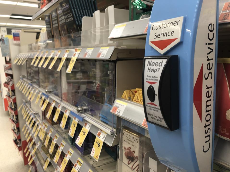 Fancy chocolate bar aisle in locked cabinet to prevent theft, Customer Service Help Button, Walgreens Pharmacy, Queens, New York
