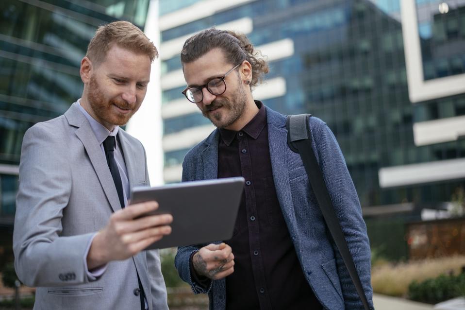 Business people discussing article stock photo