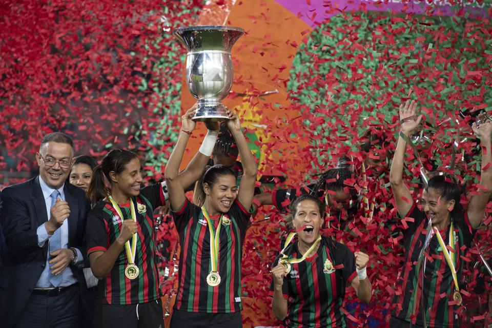 AS FAR players celebrating with the CAF Women's Champions League trophy.