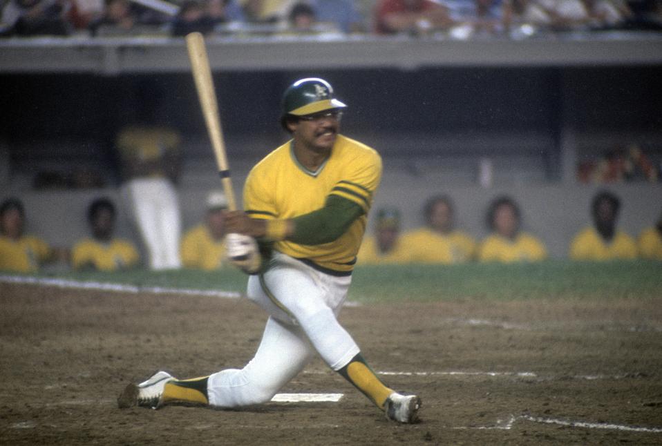 OAKLAND: Reggie Jackson of the Oakland Athletics swings and misses at a pitch during a 1974 game. (Photo by Focus on Sport/Getty Images)