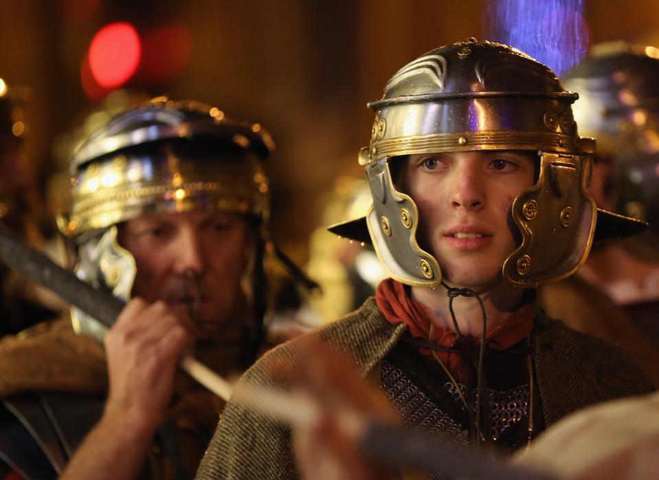 Enthusiasts And Reenactors Parade Through The Streets Of Chester As Part Of Their Roman Saturnalia Festival Celebrations