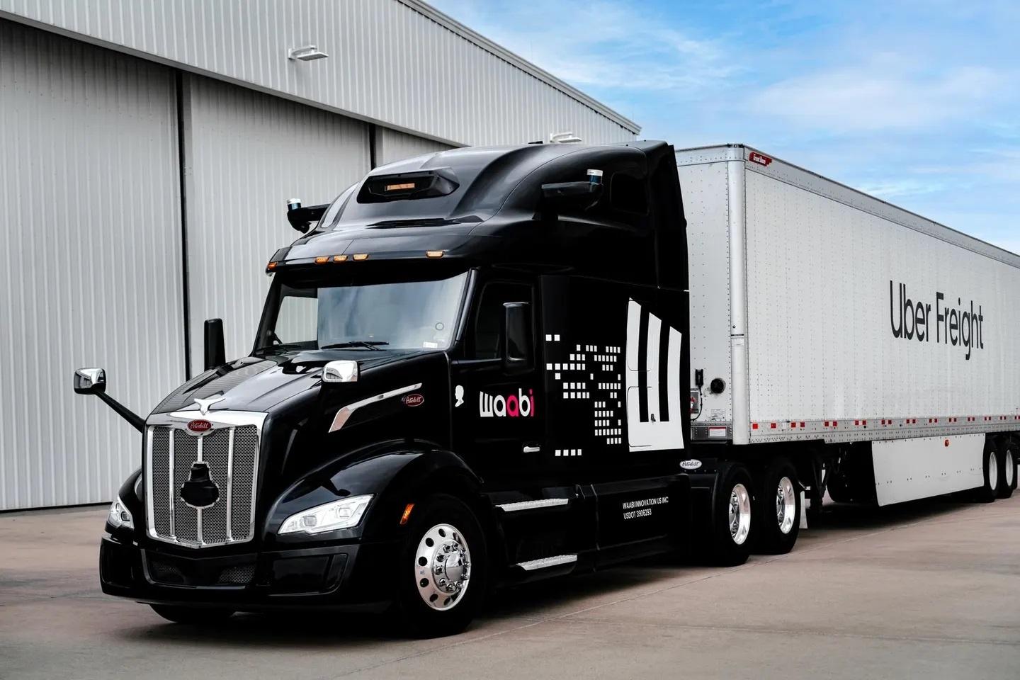 A Waabi truck pulling an Uber Freight trailer