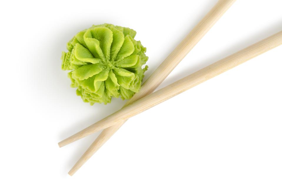 Wooden chopsticks and wasabi