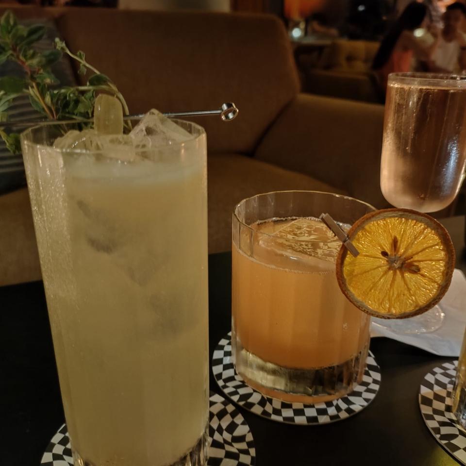 three cocktails in various glassware