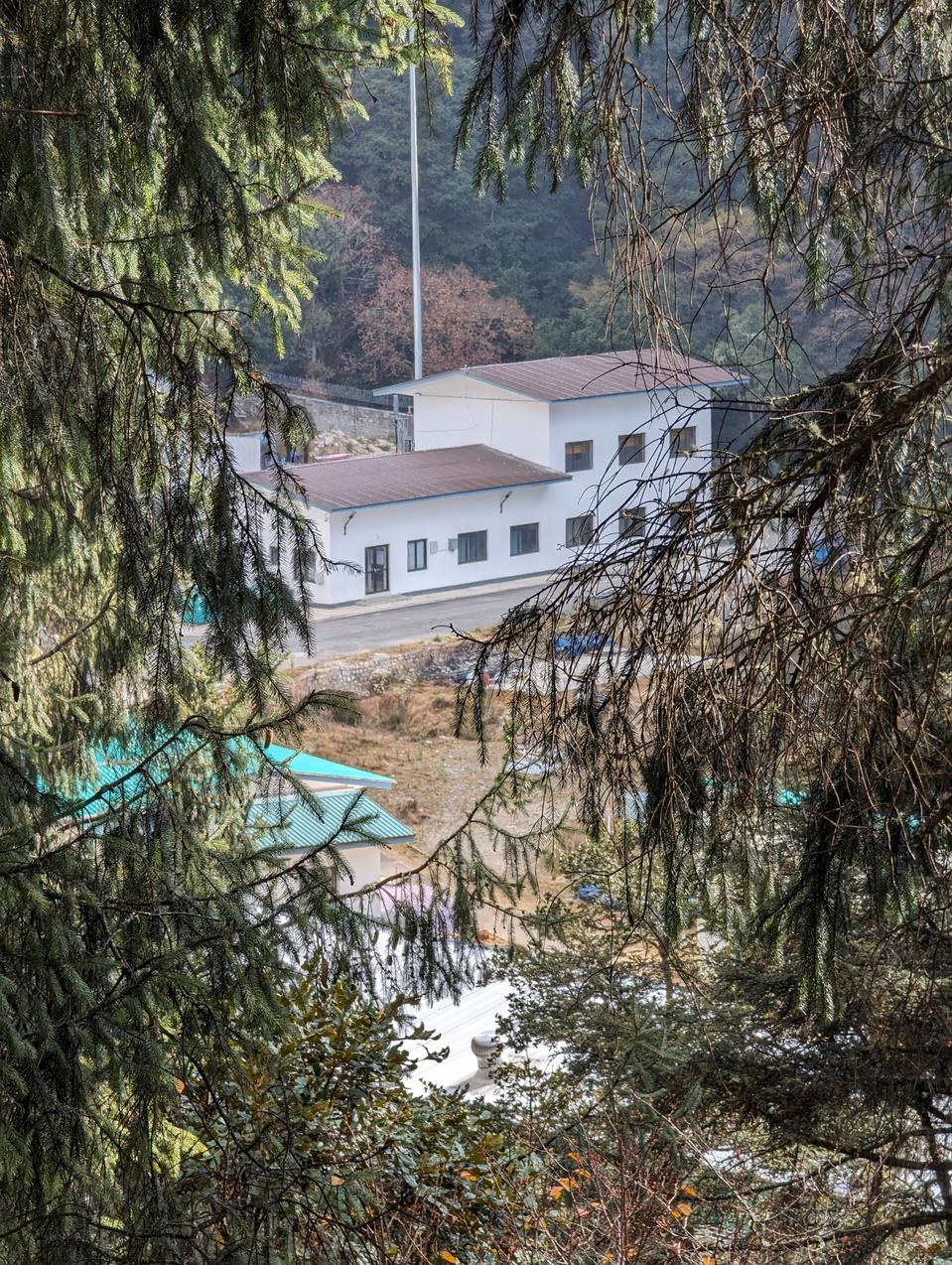 A site in Dochula, believed to be one of the kingdom's bitcoin mines, is concealed behind a thicket of trees.