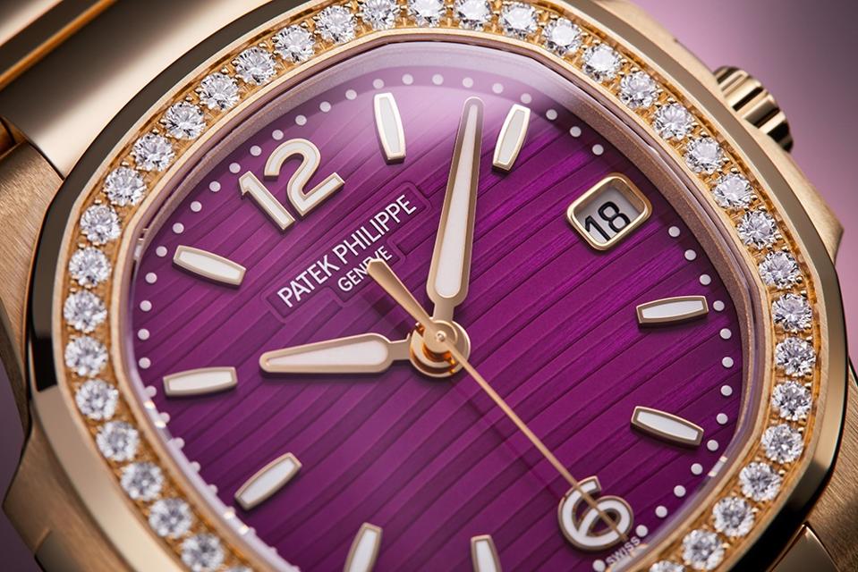 Patek Philippe Nautilus ref. 7010/1R, with purple lacquered dial and diamond bezel.