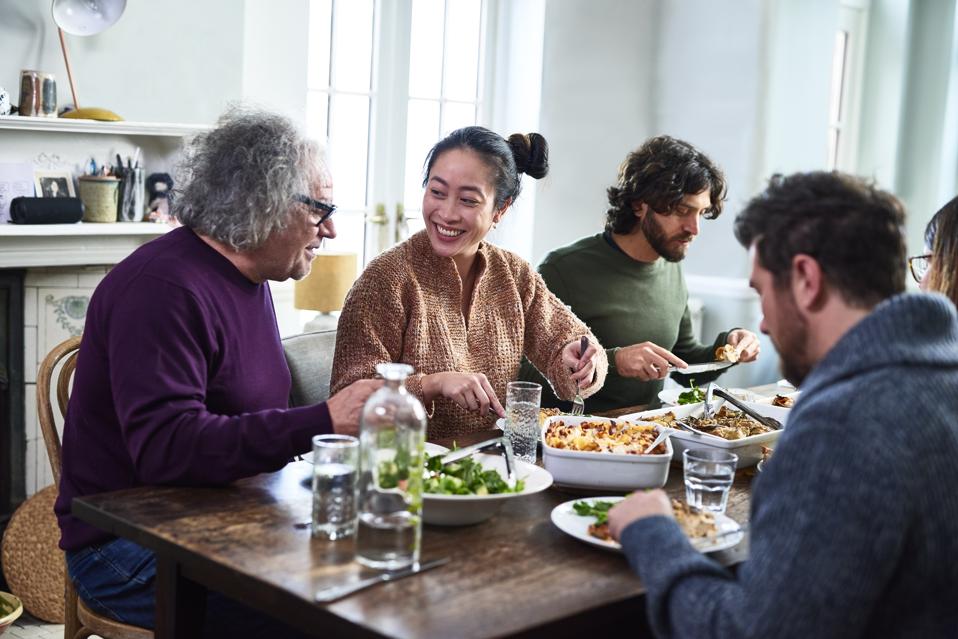 Extended family having meal together