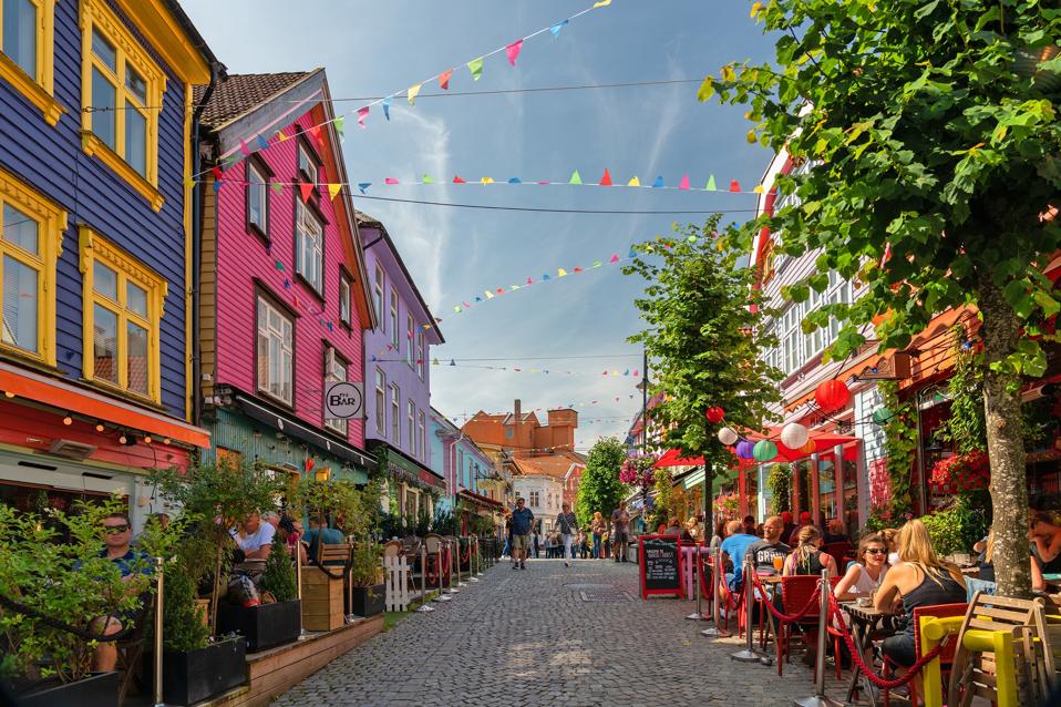 historical street in Stavanger old town with multicolor wooden houses.
