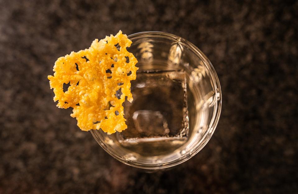 Cocktail with cheese garnish