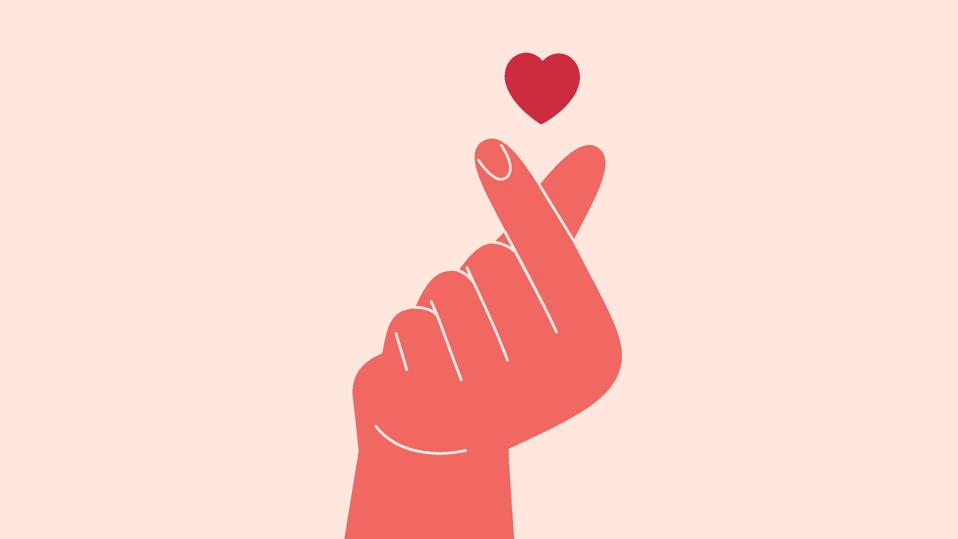 Finger mini heart symbol. Left Human Hand with index finger and thumb crossed.