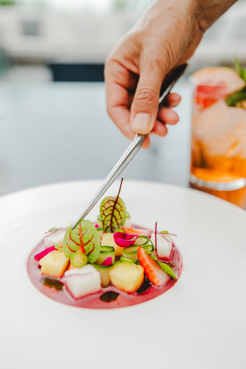 vegan ceviche with strawberries, jicama, pineapple and beet aguachile.