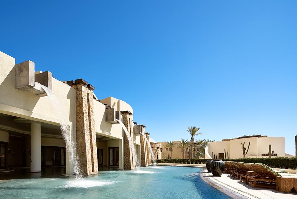 Find serenity at the spa pool’s waterfalls.