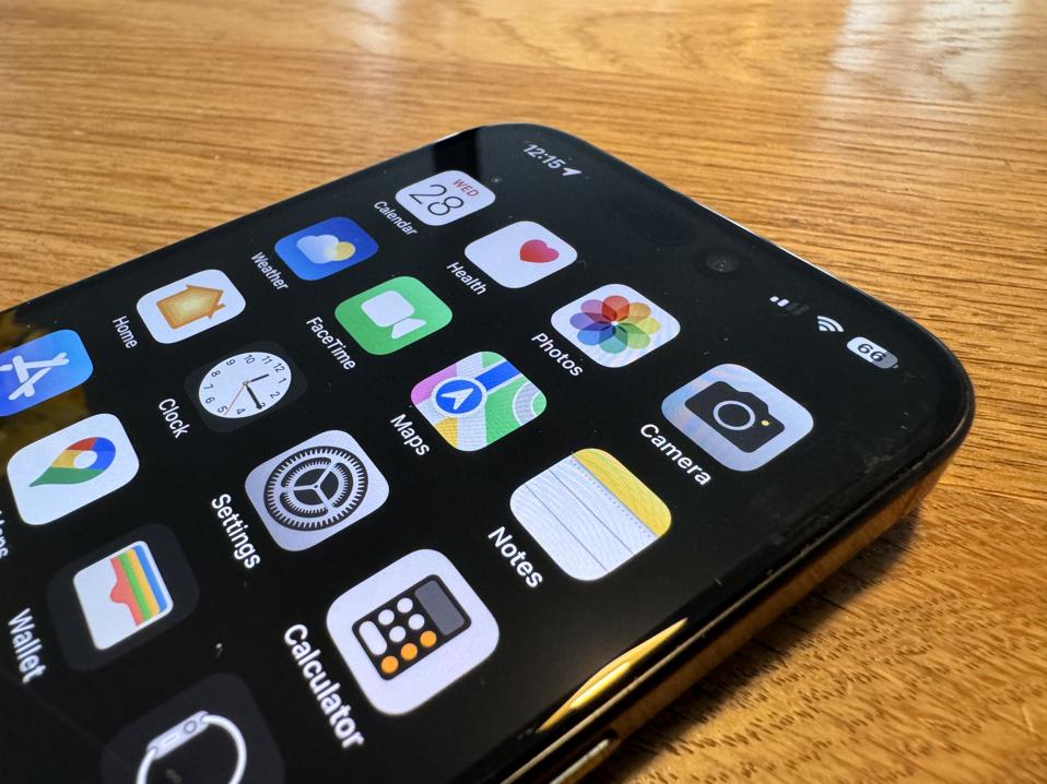iPhone 15 Pro with FaceTime on screen