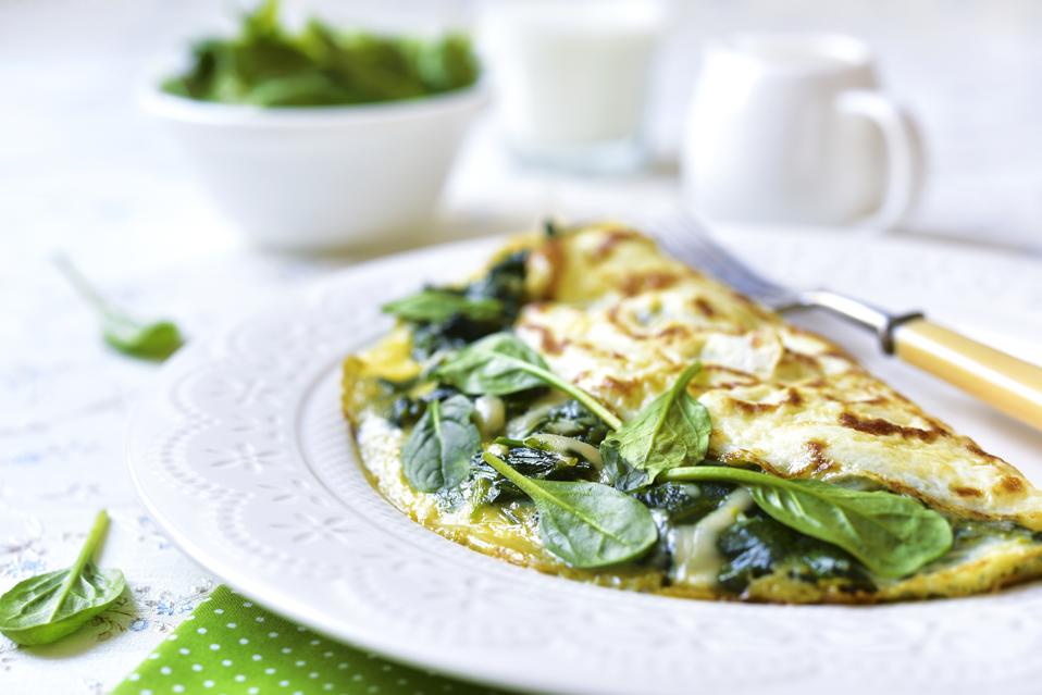 Omelette stuffed with spinach and cheese.