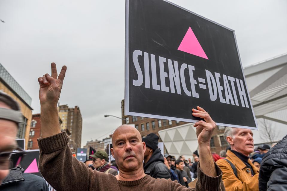 Hundreds gathered on a rally at the AIDS Memorial on West...