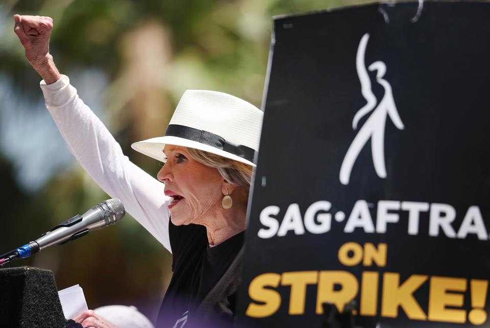 Starbucks Workers Join Striking Writers Guild And SAG-AFTRA Picketers