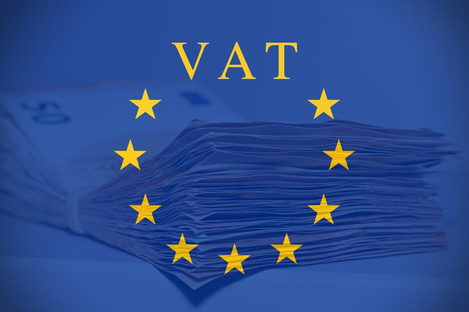 Money and the EU flag with the text "VAT"