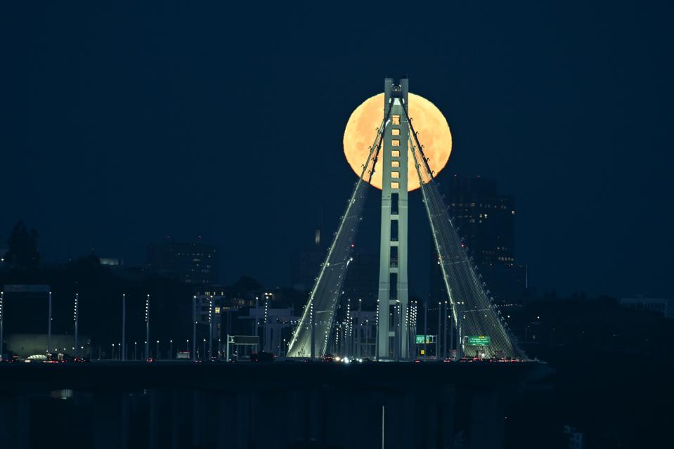 In Photos: Watch The Full 'Flower Moon' And A Massive Red Star Rise