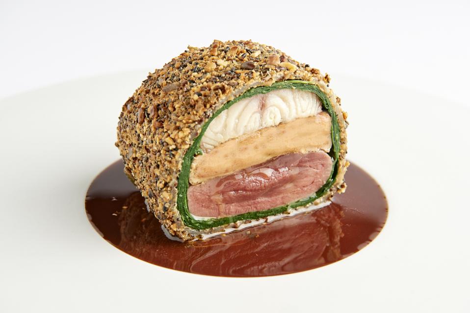 A dish prepared with pigeon, foie gras, smoked eel at restaurant Bozar, Brussels