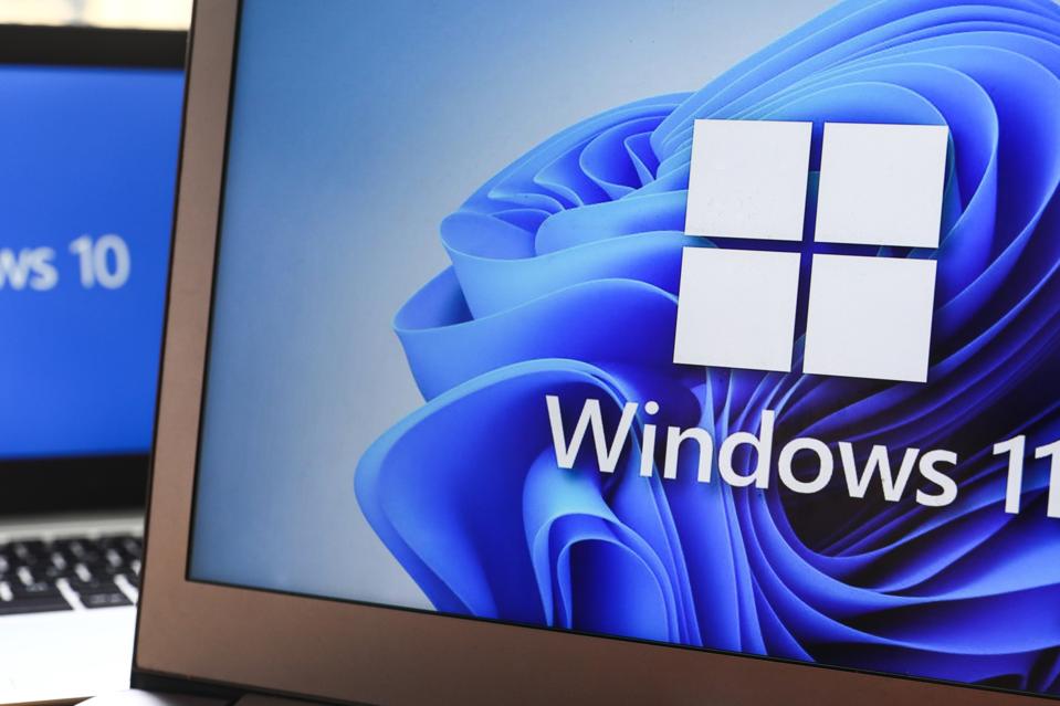 Windows 11 Vs. Windows 10 on screen.