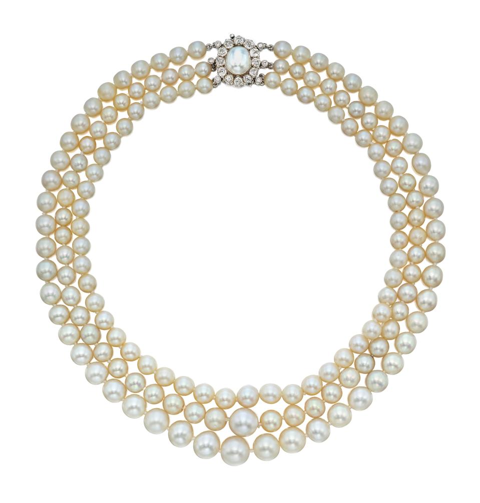 Three-strand natural pearl, cultured pearl and diamond necklace sold for $552,000