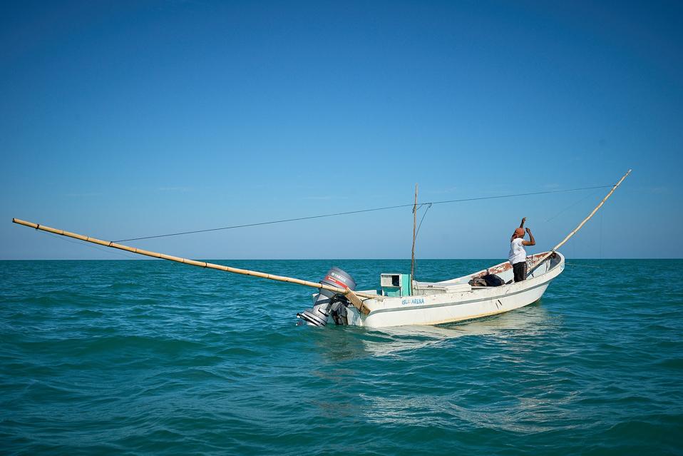 A FISHING BOAT on the sea in CAYO ARENAS