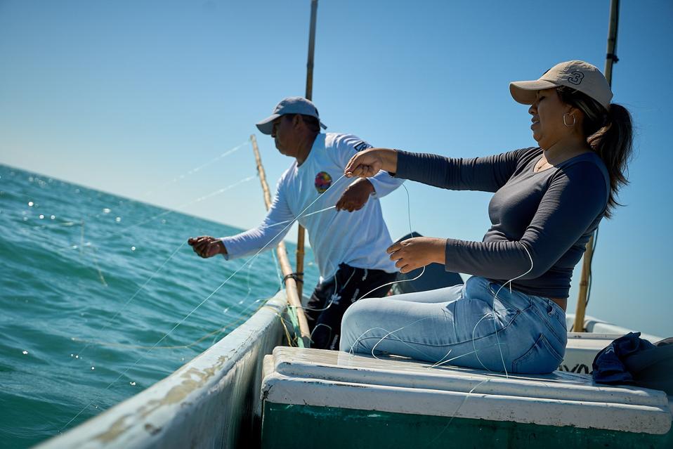 Ricardo Novelo and daughter Margarita fishing for octopus off the coast of Celestún, Mexico.