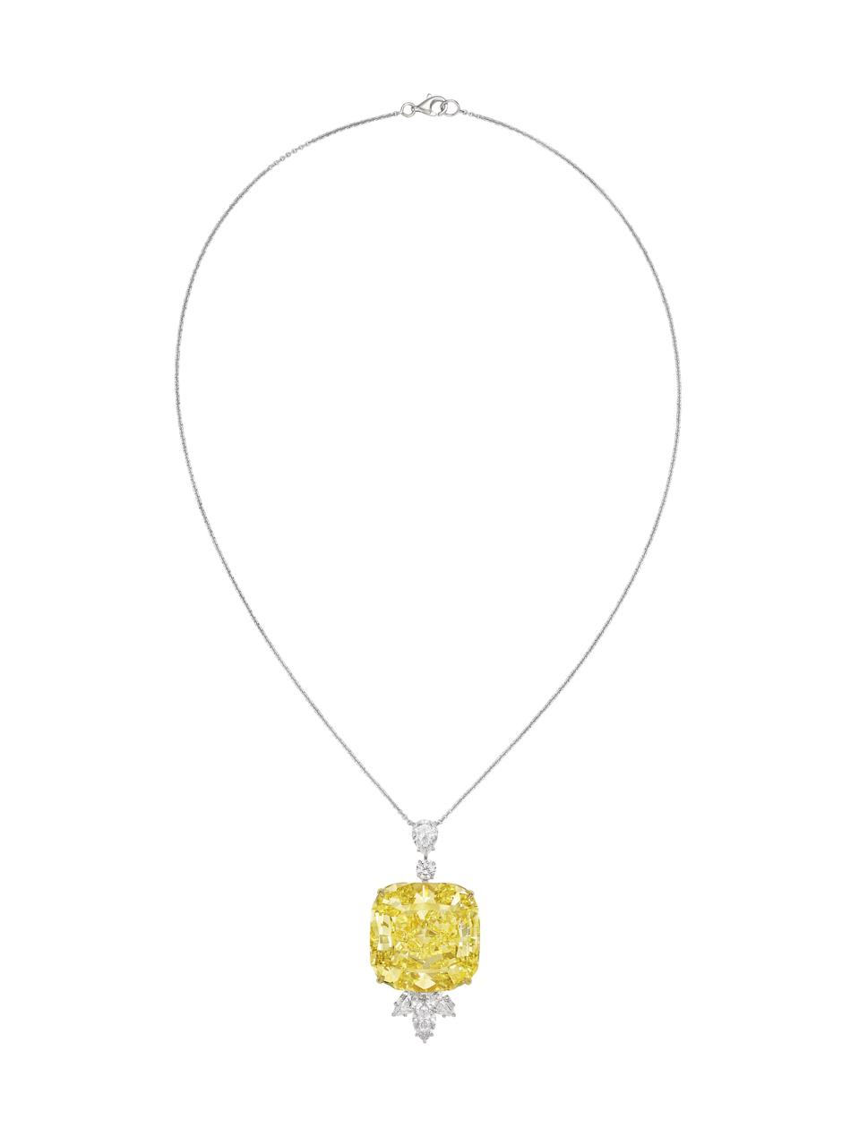 84.05-carat fancy intense yellow cushion modified diamond fetched $2.1 million