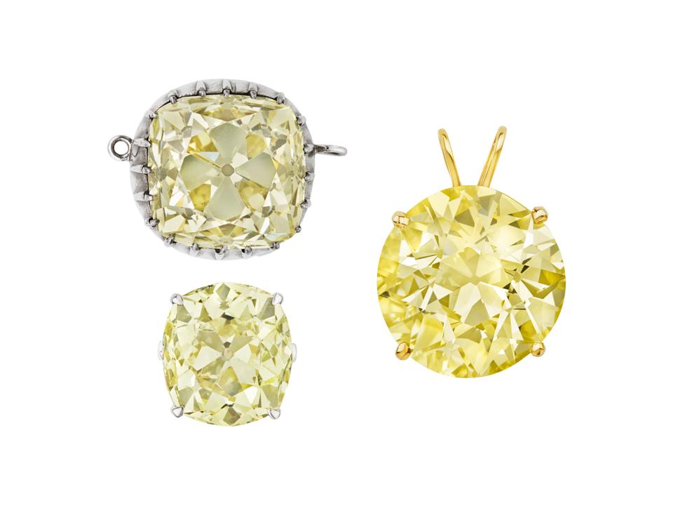 A set of three fancy yellow diamonds fetched more than $1.6 million