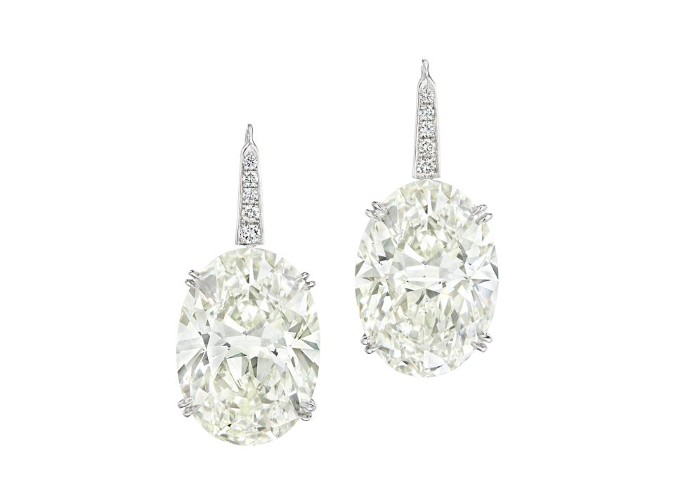 Pendant earrings with two 23-carat oval brilliant-cut diamonds fetched $1.3 million